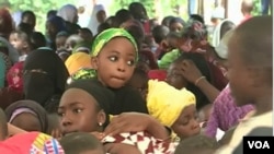 FILE - Children on the streets ask to be spared from the separatist war, in Bamenda, Cameroon, Aug. 31, 2019. Hundreds of children gathered in Yaoundé on June 6, 2022, to protest abuses against children stemming from the separatist conflict. (Moki Edwin Kindzeka/VOA) 