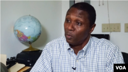 Clarens Renois, lidè pati politik Union Nationale pour l'Intégrité et la Réconciliation (UNIR).