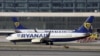 FILE - Two Boeing 737-8AS passenger aircrafts of Ryanair airline taxi on a runway at Malaga-Costa del Sol airport, in Malaga, Spain, May 3, 2024. 