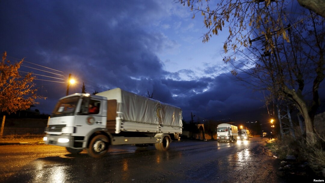 Red Crescent aid convoy enters Madaya, Syria, Jan. 14, 2016. 