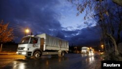 Red Crescent aid convoy enters Madaya, Syria, Jan. 14, 2016. 