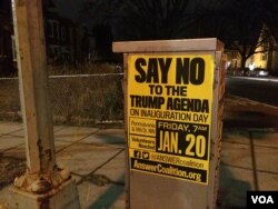 The ANSWER coalition has put up posters across DC calling for people to join their protest against Donald Trump on inauguration day (E. Sarai/VOA News)