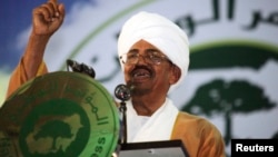 FILE - Sudanese President Omar Hassan al-Bashir addresses the general conference of the ruling National Congress Party in Khartoum, Oct. 23, 2014.