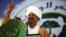 Sudanese President Omar Hassan al-Bashir addresses the general conference of the ruling National Congress Party in Khartoum, Oct. 23, 2014.