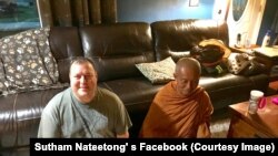 Christian Kobel (L) meditate with the Buddhist monk Sutham Nateetong (R) during the monk visits in his house in Dwight, Illinois. May 31, 2019. The Thai monk is on his journey walk across America to promote peace.