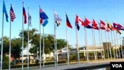 Flags fly in front of the National Convention Centre ahead of the 44th and 45th ASEAN Summits and Related Summits, in Vientiane, Laos.