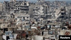 Cảnh nhà cửa trong thành phố Homs bị tàn phá
