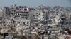 تخلیه رزمندگان از حمص به تاخیر افتاد