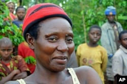 Marie Claudine Yansoneye is a Rwandan farmer who is not keen on mixing bananas and coffee, October 2011.