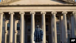FILE - The U.S. Treasury Department building is seen in Washington, June 8, 2017.