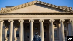 FILE - The U.S. Treasury Department building is seen in Washington, June 8, 2017.