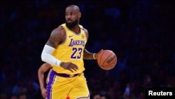 Los Angeles Lakers forward LeBron James controls the ball against the New Orleans Pelicans on March 4, 2025. Mandatory (Gary A. Vasquez-Imagn Images)