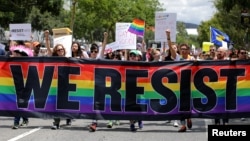 The annual Pride Parade is replaced with a Resist March as members of the LGBT community protest President Donald Trump in West Hollywood, California, June 11, 2017. 