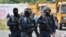 Kosovo special police officers are pictured as hundreds of Kosovo Serbs protest against a government ban on entry of vehicles with Serbian registration plates in Jarinje, Kosovo, September 21, 2021. REUTERS/Laura Hasani/File Photo