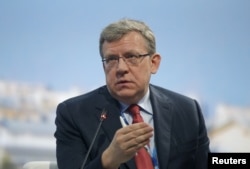 FILE - “Russia is not significantly affected by Brexit,” tweeted Russia’s former finance chief, Alexei Kudrin. “We have our own problems.”