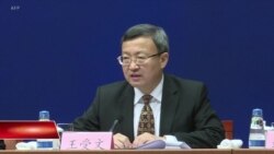 Trung Quốc: Không thể đàm phán khi bị áp thuế