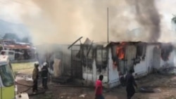 This Port-au-Prince courthouse was set on fire by angry protesters demanding justice for their friend allegedly killed by police. (Photo: Matiado Vilme / VOA)