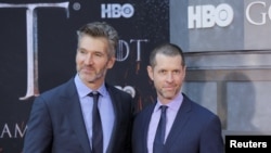 FILE - David Benioff and D.B. Weiss arrive for the premiere of the final season of "Game of Thrones" at Radio City Music Hall in New York, April 3, 2019.