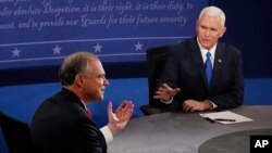 Tim Kaine (à g.) et Mike Pence, lors de leur débat de mardi soir, à Longwood University, Farmville, Virginie, le 4 octobre 2016.