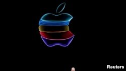 FILE - CEO Tim Cook speaks at an Apple event at their headquarters in Cupertino, California, Sept. 10, 2019. 