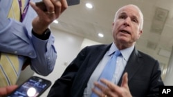 Senate Armed Services Committee Chairman Sen. John McCain, R-Ariz., speaks to reporters on Capitol Hill in Washington, March 8, 2017.