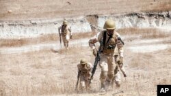 Pasukan Burkina Faso mengikuti latihan militer kontraterorisme yang dipimpin oleh AS di Thies, Senegal, 18 Februari 2020. (Foto: AP)