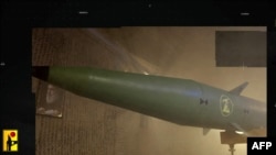 A handout image released by the Hezbollah military media press office on Sept. 25, 2024, shows a "Qader 1" ballistic missile at an undisclosed location.