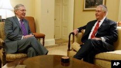 Senate Majority Leader Mitch McConnell of Kentucky, left, meets with Rex Tillerson, on Capitol Hill, Jan. 4, 2017. 