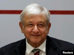 FILE - Mexico's President-elect Andres Manuel Lopez Obrador attends a meeting with elected Mexican senators at a hotel in Mexico City, Mexico, Aug. 15, 2018.