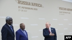 Russian President Vladimir Putin meets with Comoros President and the Chairperson of the African Union Azali Assoumani and Moussa Faki Mahamat, the Chairperson of the African Union Commission, during the second Russia-Africa summit in Saint Petersburg on on July 27, 2023.