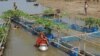 Floating farms where villagers raise fish and ducks and grow vegetables can provide valuable food and income when agricultural land is flooded in northwest Bangladesh during the months-long rainy season. (Amy Yee for VOA)