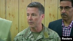 Commander of NATO forces in Afghanistan U.S. General Scott Miller attends a meeting in the Kandahar Governor's Compaund in Kandahar, Afghanistan, Oct. 18, 2018.