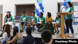 Student leaders and a professor at Duke University lead a presentation sharing information new international students will need.