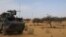 FILE - A light armored vehicle of the French counterterrorism Barkhane force in Africa's Sahel region is seen near the town of Gossi, central Mali, March 25, 2019.