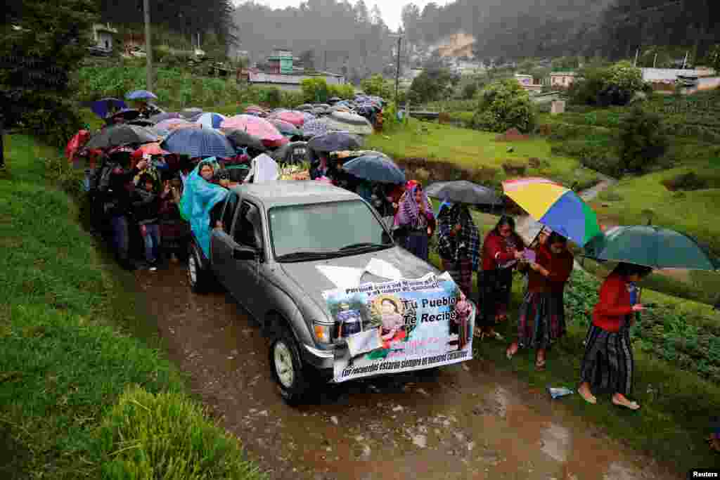 Relatives and friends of Claudia Gomez, a 19-year old Guatemalan immigrant who was shot by a U.S. Border Patrol officer, take part in her funeral procession towards a cemetery in San Juan Ostuncalco, Guatemala, June 2, 2018.