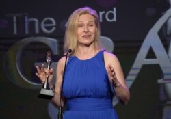 FILE - Mary Louise Kelly accepts the award for best reporter/correspondent/host - non-commercial for "All Things Considered" on "NPR News" at the 43rd annual Gracie Awards at the Beverly Wilshire Hotel, May 22, 2018, in Beverly Hills, Calif.