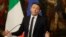 Italian Prime Minister Matteo Renzi speaks during a press conference at the premier's office Chigi Palace in Rome, early Monday, Dec. 5, 2016. Renzi acknowledged defeat in a constitutional referendum and announced he would resign on Monday. 