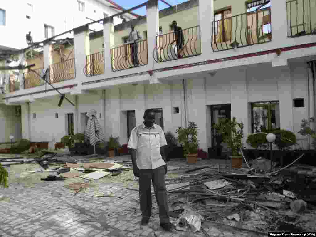 South Sudan Hotel manager Mel Garang Yout surveys damage after fire ripped through the hotel on Oct. 2, 2013.