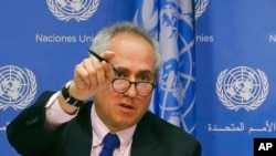 FILE - United Nations spokesman Stephane Dujarric fields questions at U.N. headquarters, June 20, 2017.