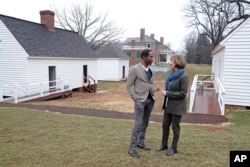 FILE - Brent Leggs, Director, African American Cultural Heritage Action Fund, National Trust for Historic Preservation, and Kat Imhoff, President and CEO, The Montpelier Foundation, on February 10, 2018, in Montpelier Station, Virginia.