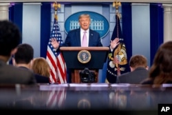 President Donald Trump speaks at a news conference in the James Brady Press Briefing Room at the White House, Aug. 11, 2020, in Washington.