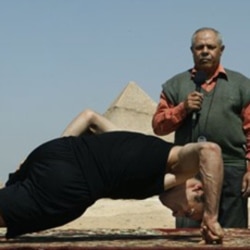 An Egyptian man, Mohammed Ali Zinhom, attempts a Guinness world record last year for doing push-ups on two fingers of his right hand only