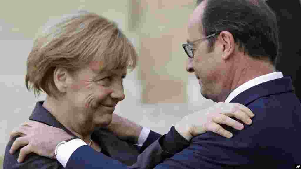 Shugaban Faransa Francois Hollande a Shugaban Jamus Angela Merkel.