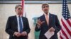 美国国务卿克里（右）和英国外相哈蒙德在伦敦举行的叙利亚国际捐助国会议上向媒体讲话。（2016年2月4日）