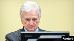 Arhiva - Momčilo Perišić, bivši šef Generalštaba Vojske Jugoslavije, u sudnici Haškog tribunala, 28. februara 2013. (Rojters/Koen Van Weel/ANP/Pool)