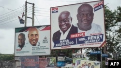 The campaign billboards of Ghana's two main political parties running in this year's national election are shown in the streets of Accra in Ghana, Oct. 8, 2016.