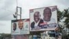 FILE - The campaign billboards of Ghana's two main political parties running in this year's national election are shown in the streets of Accra, Oct. 8, 2016.
