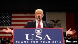 U.S. President-elect Donald Trump speaks at the USA Thank You Tour event in Des Moines, Iowa, Dec. 8, 2016.