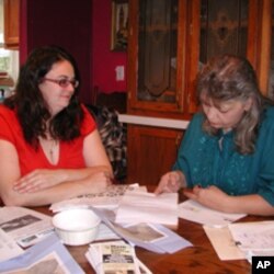 Kim McEvoy and Janet McIntyre, who feel their drinking water has been contaminated by nearby natural gas extraction, do some grassroots organizing around the kitchen table.