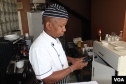 Samuel Kinuthia, a chef in Nairobi, uses Branch for loans for his business. (L. Ruvaga/VOA)
